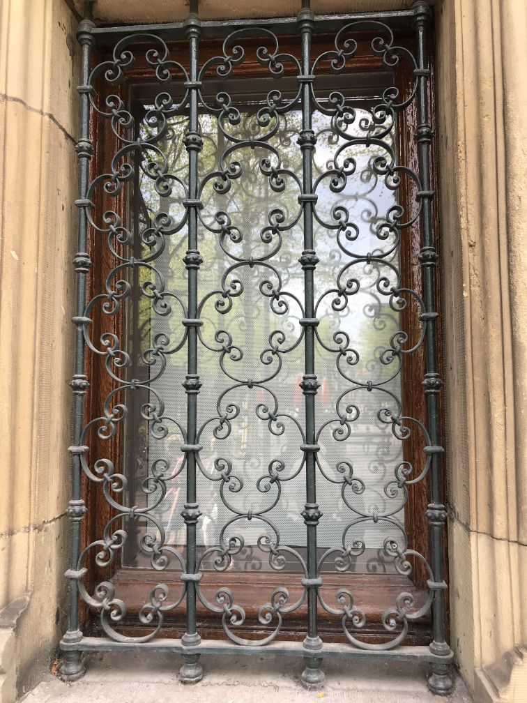 Window with ornate grill
